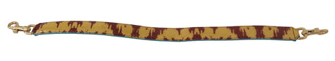 Yellow and red leather Dolce & Gabbana shoulder strap with gold-tone hardware, styled with detailed stitching and brand logo accents.