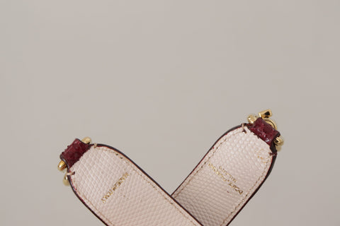 Dolce & Gabbana Bordeaux leather bag with crystal-embellished shoulder strap, stylish accessory for luxury handbags.