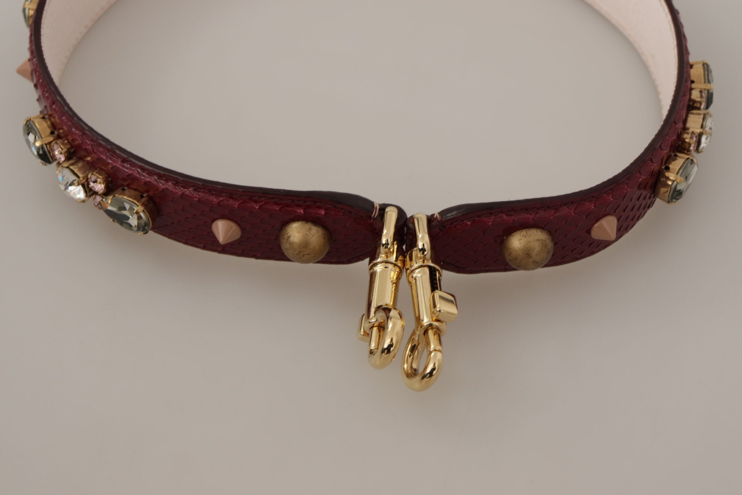 Dolce & Gabbana Bordeaux leather bag shoulder strap with crystal embellishments, designed for luxury handbags.