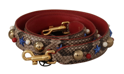 Brown Python leather shoulder strap with silver studs, designed by Dolce & Gabbana, featuring textured python skin and adjustable length.