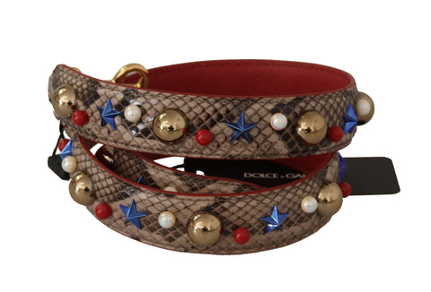 Brown Python leather shoulder strap with silver studs, designed by Dolce & Gabbana, featuring textured python pattern and adjustable length.