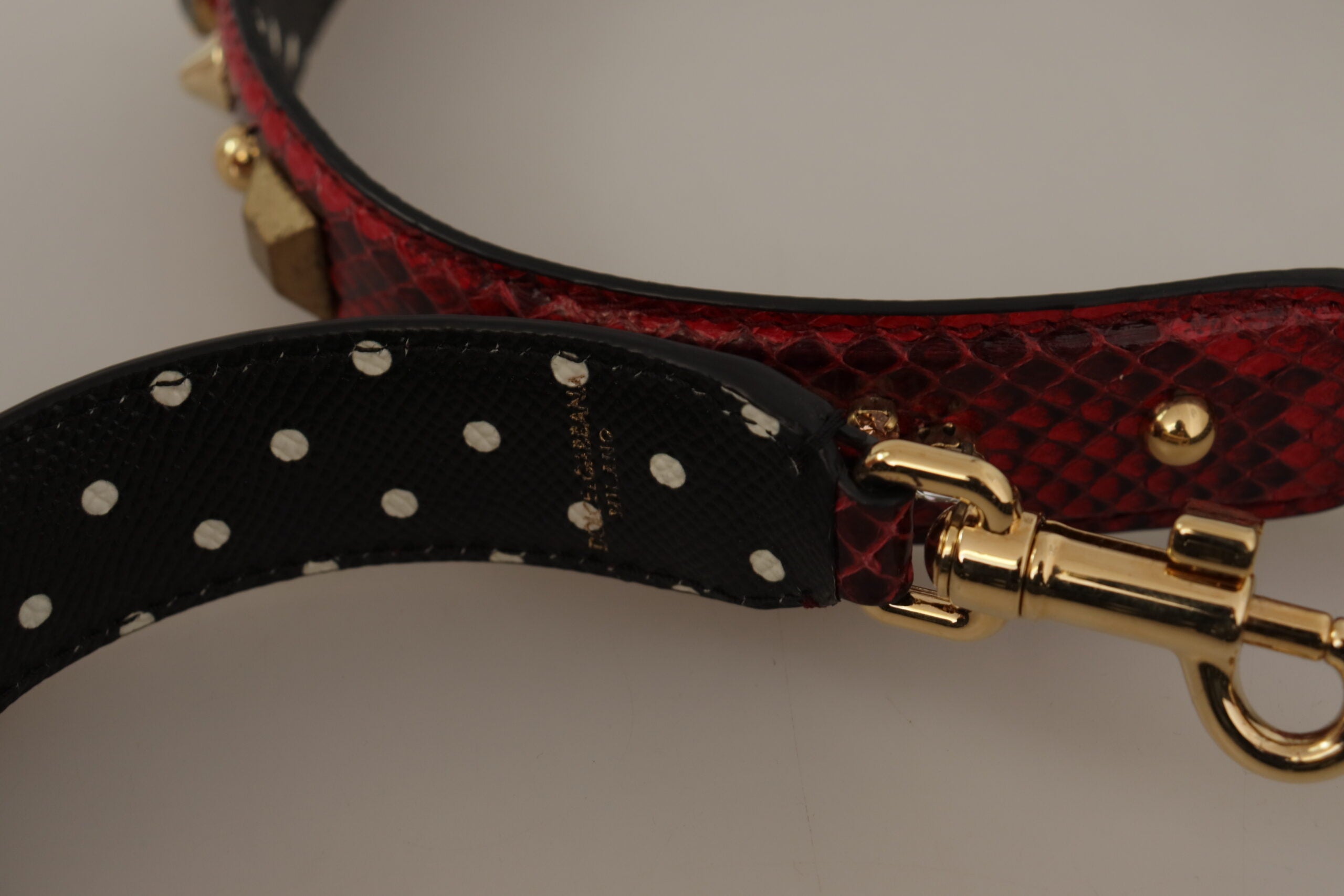 Red Python leather Dolce & Gabbana reversible shoulder strap with crystal embellishments, stylish and versatile accessory.