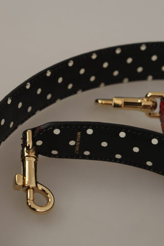Red Python leather reversible shoulder strap with crystal accents, designed by Dolce & Gabbana, featuring textured python pattern and hardware.