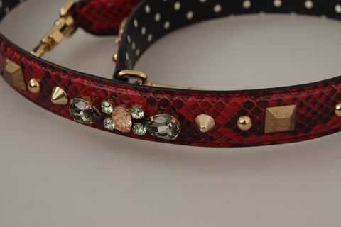 Red Python leather reversible shoulder strap with crystals from Dolce & Gabbana, showing its textured python pattern and decorative crystals.