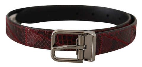 Red exotic leather belt with metal logo buckle from Dolce & Gabbana, showcasing high-quality craftsmanship and stylish accessory details.