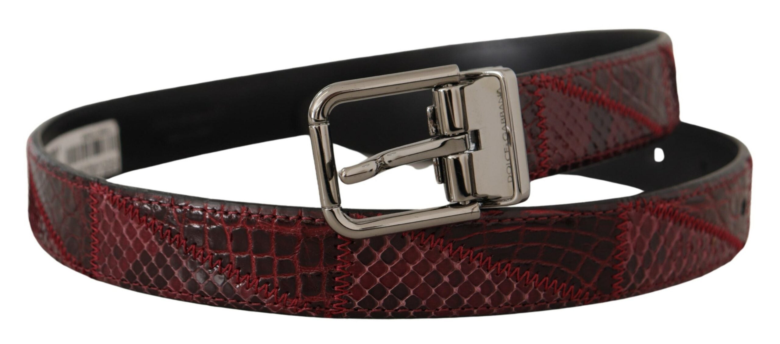 Red exotic leather belt with metal logo buckle from Dolce & Gabbana, featuring textured leather and sleek metal hardware.