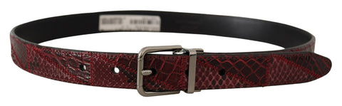 Red exotic leather belt with metal logo buckle by Dolce & Gabbana, featuring textured leather and polished silver hardware.