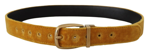 Dolce & Gabbana mustard velvet belt with gold logo engraved metal buckle, stylish accessory with luxurious texture and design.