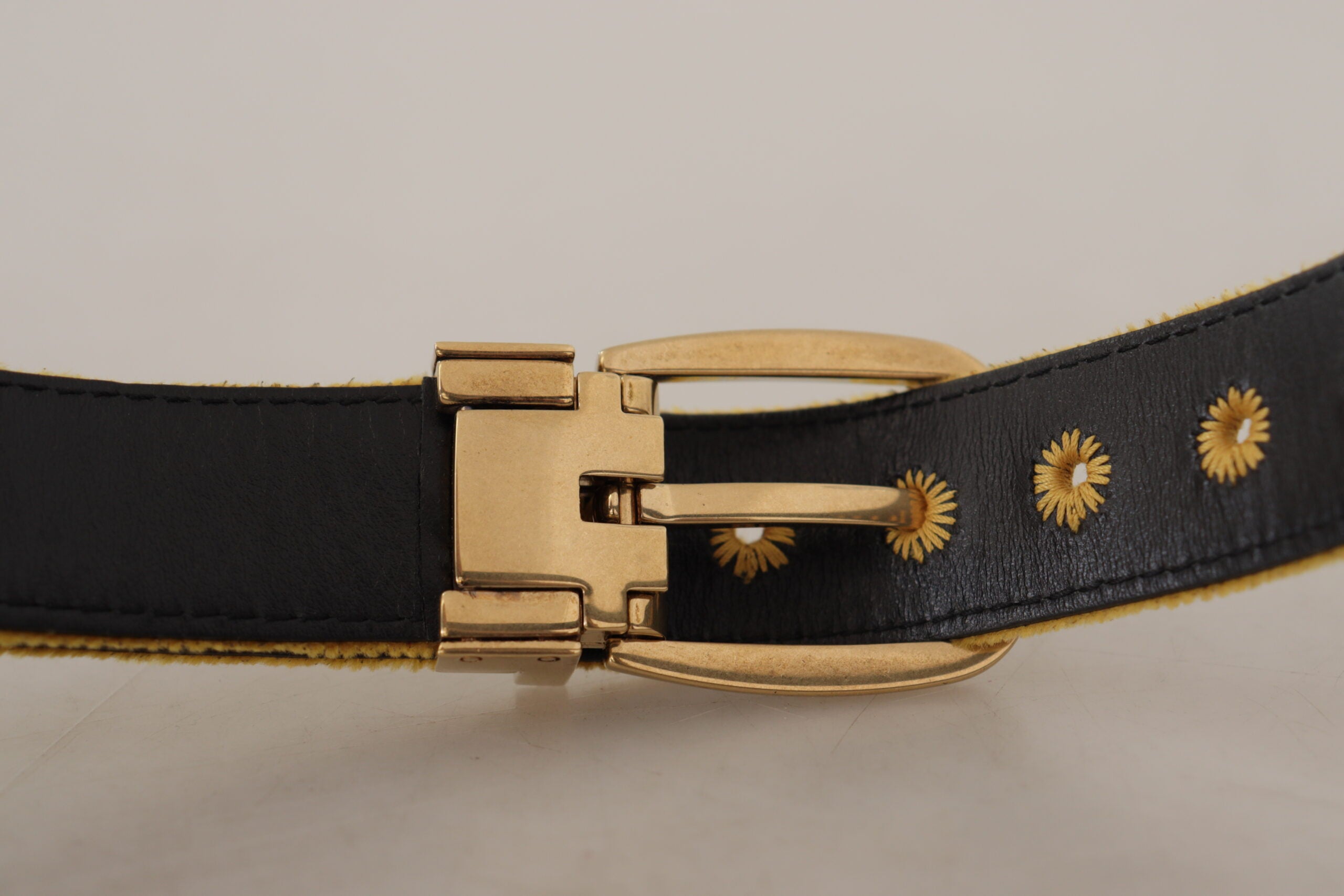 Dolce & Gabbana mustard velvet belt with gold logo engraved metal buckle, stylish accessory for fashion outfits.