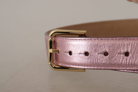 Metallic pink polished leather belt with Dolce & Gabbana logo metal buckle, featuring a sleek and shiny finish.