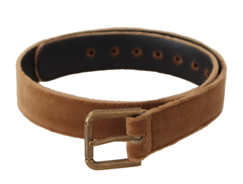 Brown velvet belt with bronze vintage logo metal buckle from Dolce & Gabbana, showcasing luxurious fabric and classic design.