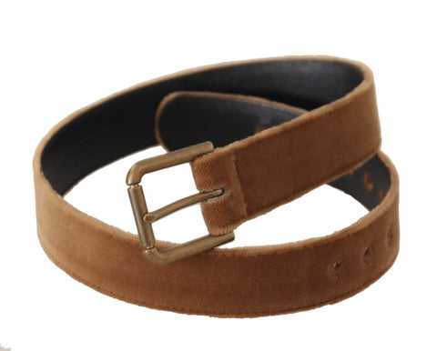 Brown velvet belt with bronze vintage logo metal buckle from Dolce & Gabbana, displayed on a neutral background.