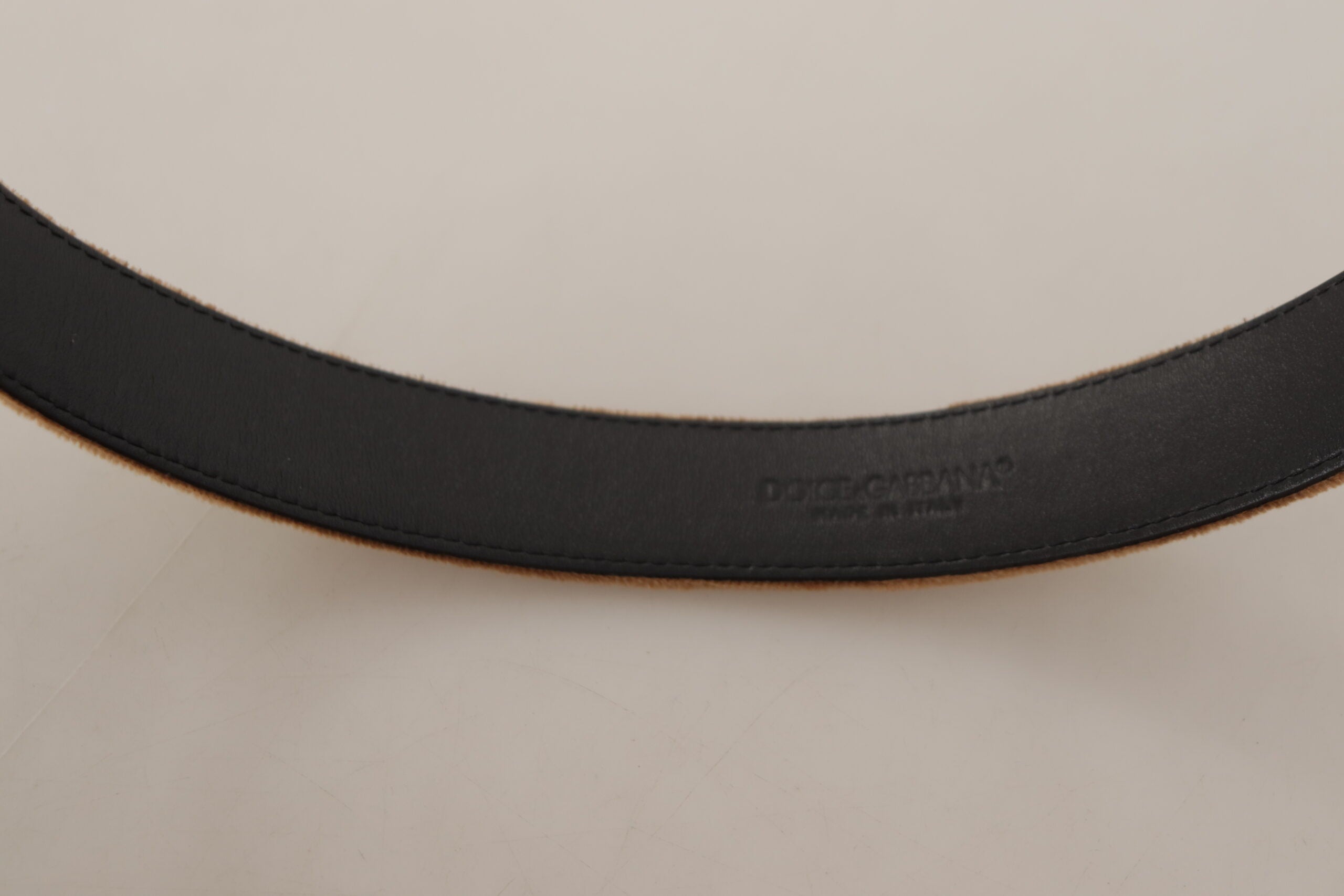 Brown velvet belt with bronze vintage logo metal buckle by Dolce & Gabbana, featuring a luxurious velvet strap and classic hardware.