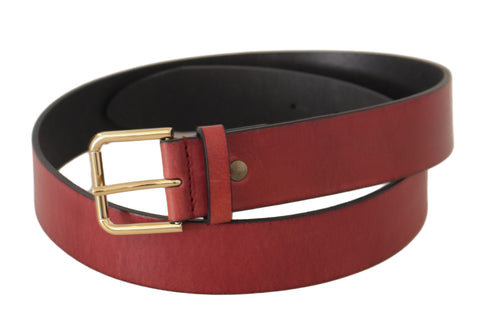 Red leather belt with gold logo engraved metal buckle from Dolce & Gabbana, featuring a sleek and stylish design.