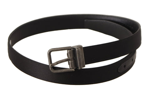 Black calfskin leather vintage metal buckle belt by Dolce & Gabbana, featuring a classic design and sturdy metal buckle.