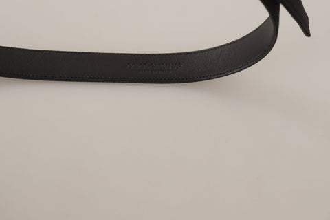 Black calfskin leather vintage metal buckle belt by Dolce & Gabbana, featuring a sleek design and classic buckle detail.