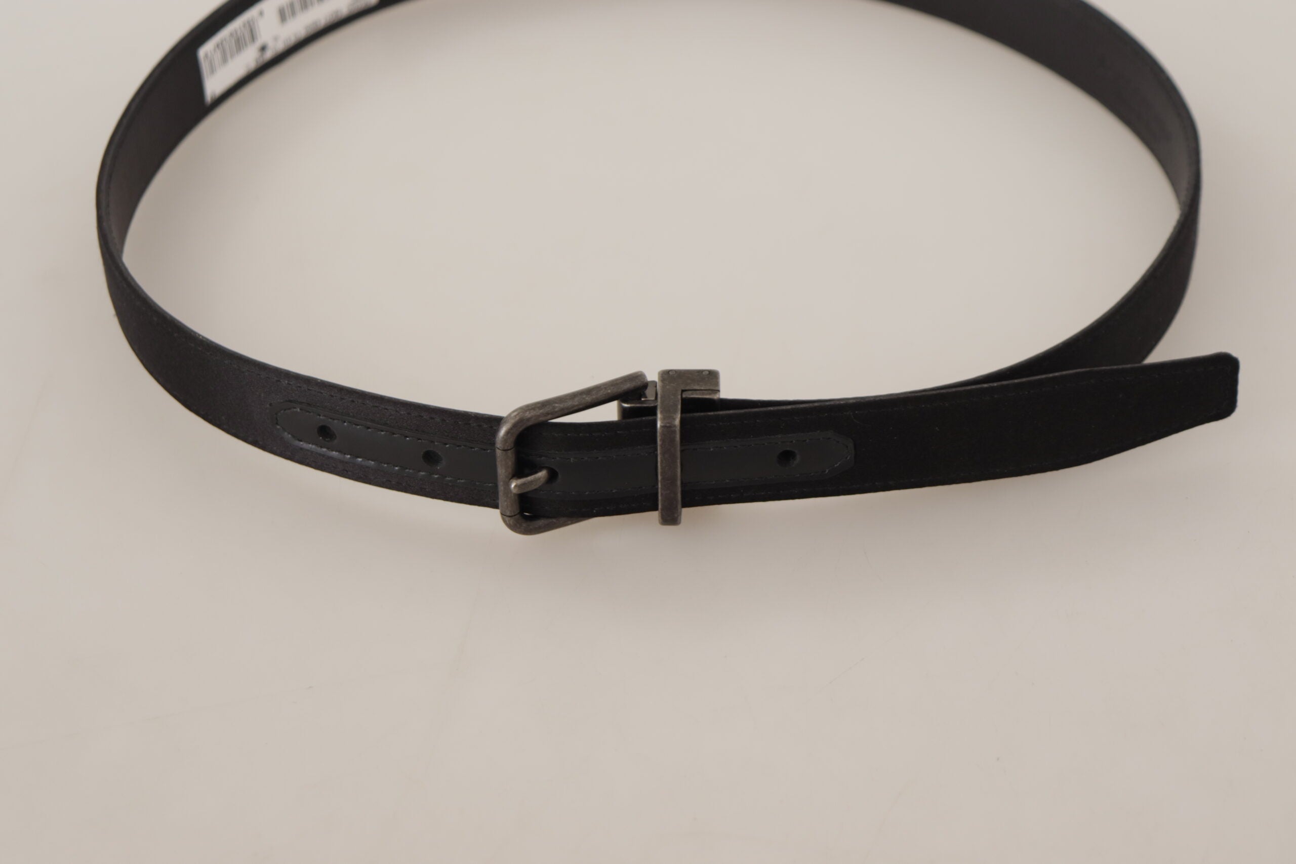 Black calfskin leather vintage belt with metal buckle from Dolce & Gabbana, featuring a classic design and sleek finish.