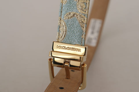 Blue leather jacquard embossed belt with gold metal buckle by Dolce & Gabbana, showcasing intricate pattern and luxurious design.