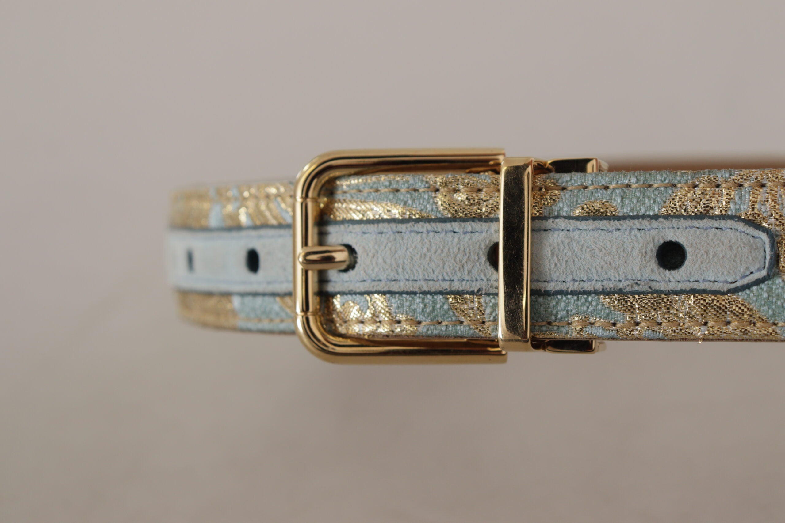 Blue leather jacquard embossed belt with a gold metal buckle from Dolce & Gabbana, featuring intricate pattern and stylish design.