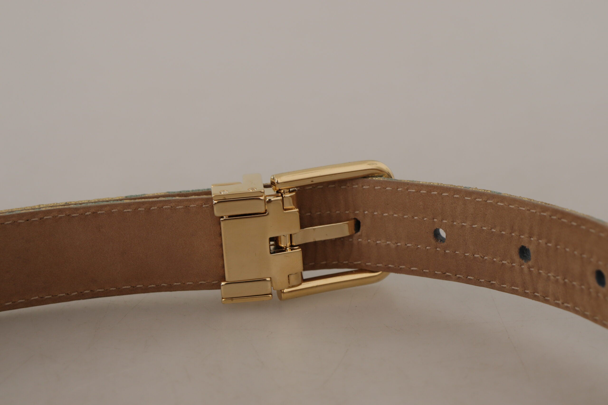 Blue leather jacquard belt with embossed pattern and gold metal buckle by Dolce & Gabbana