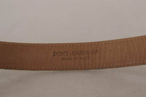 Blue leather jacquard embossed belt with gold metal buckle by Dolce & Gabbana, featuring intricate textured pattern and stylish design.