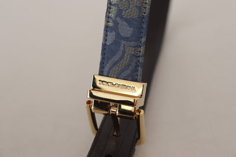 Navy blue Jacquard belt with gold-tone logo metal buckle from Dolce & Gabbana, detailed fabric pattern and sleek design.