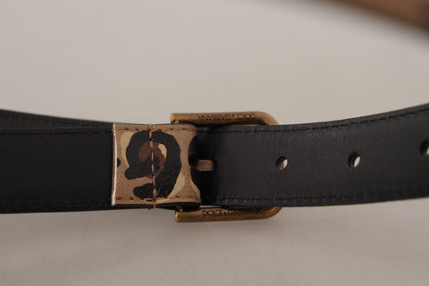 Brown leopard print vintage metal waist belt with buckle from Dolce & Gabbana, featuring bold animal print design.