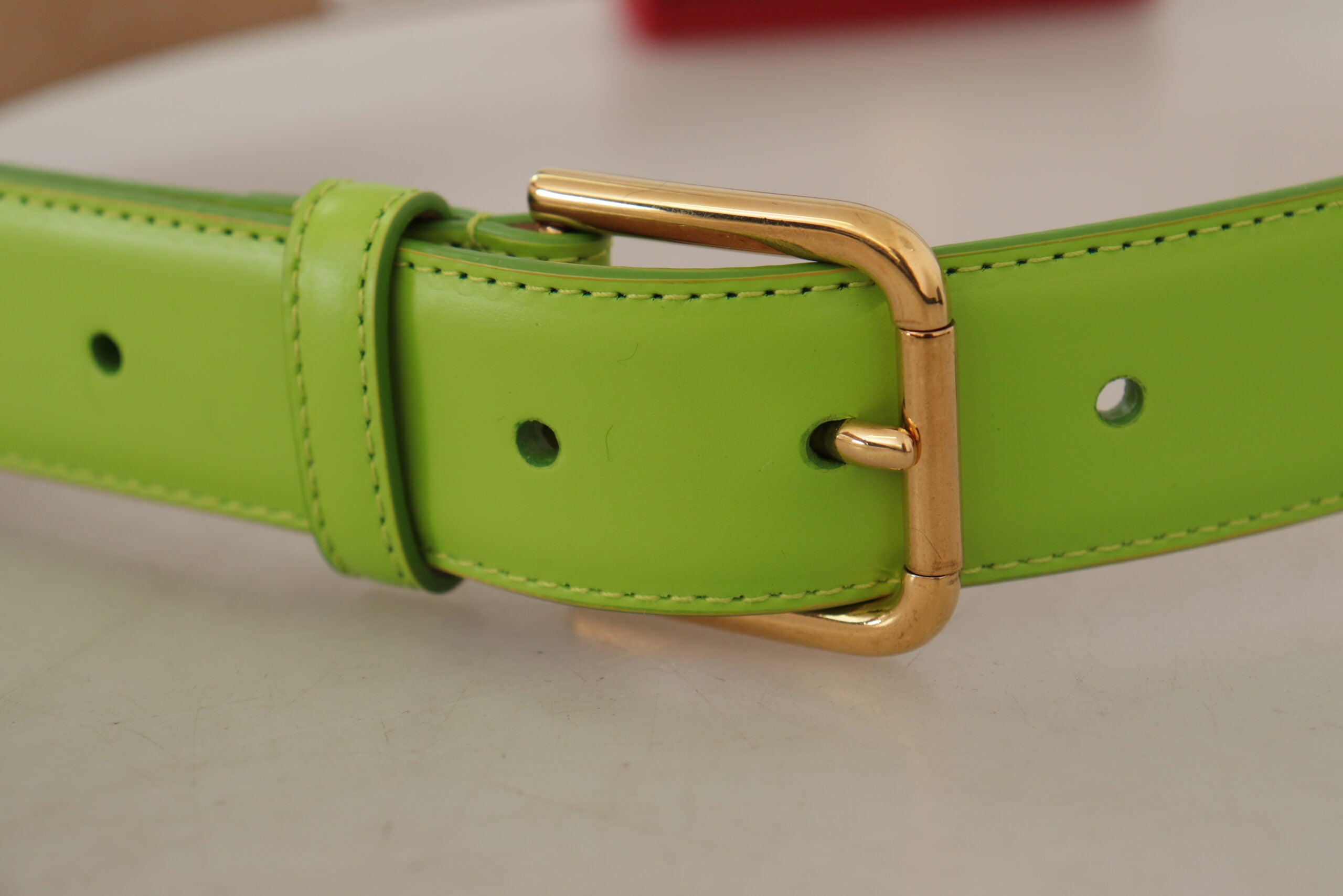 Green leather Devotion Heart micro bag with headphone and belt details, by Dolce & Gabbana.