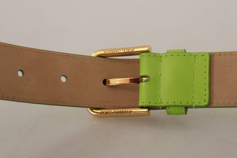 Green leather Devotion Heart micro bag with headphones and belt from Dolce & Gabbana, featuring a compact design and heart-shaped details.