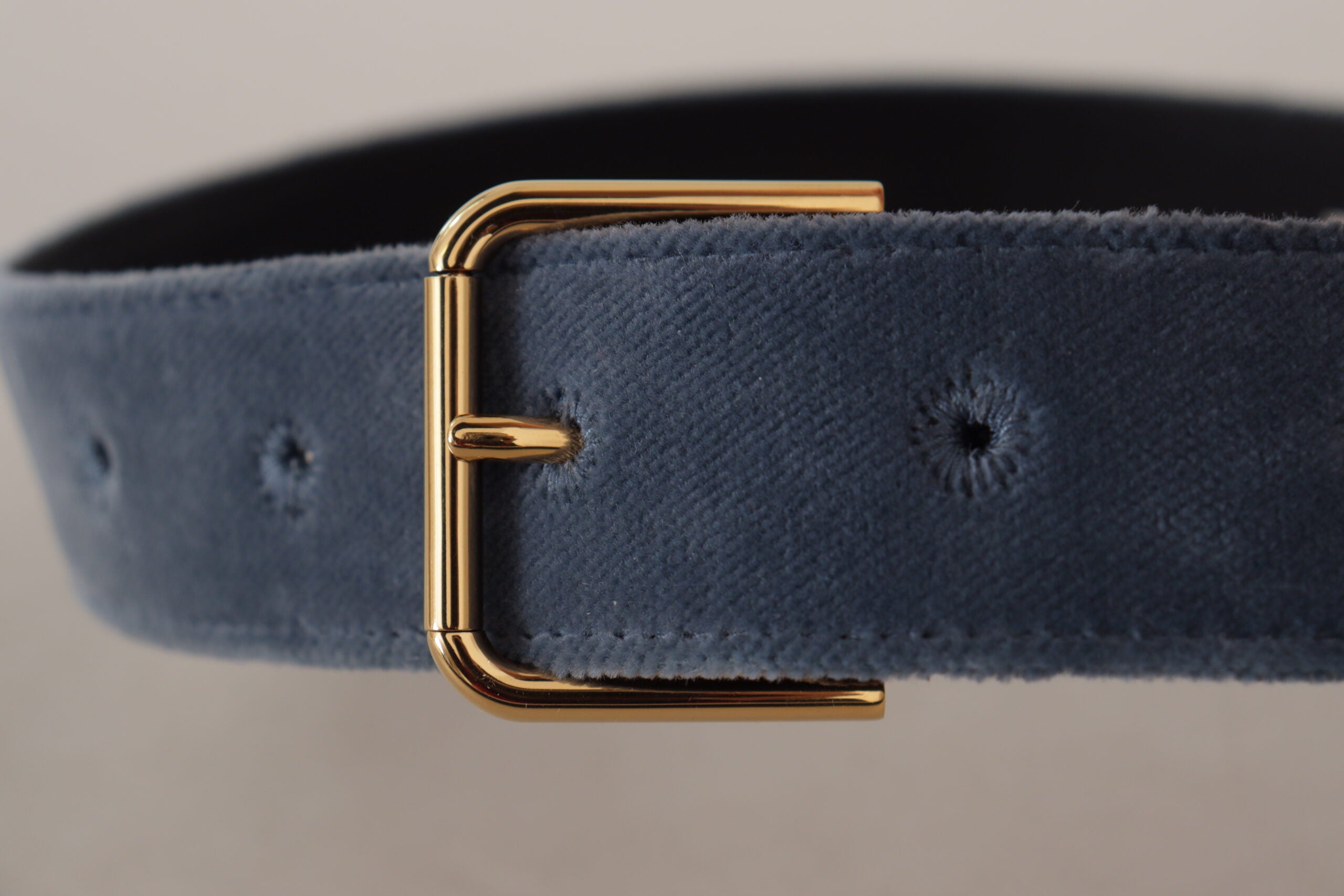 Navy blue velvet waist belt with gold metal logo buckle by Dolce & Gabbana, featuring a sleek and luxurious design.