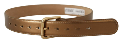 Bronze leather waist belt with gold logo engraved buckle from Dolce & Gabbana, showcasing a stylish and sleek accessory.