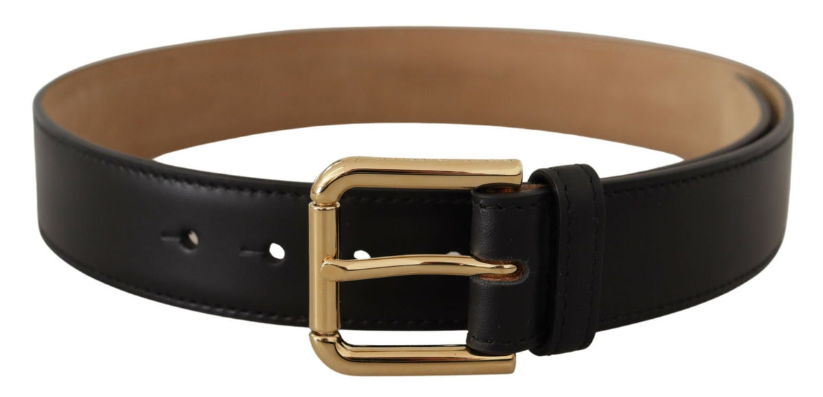 Black solid leather waist belt with gold buckle from Dolce & Gabbana, featuring a classic design and adjustable strap.