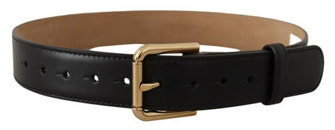 Black solid leather belt with a gold waist buckle from Dolce & Gabbana, featuring a classic design and smooth finish.