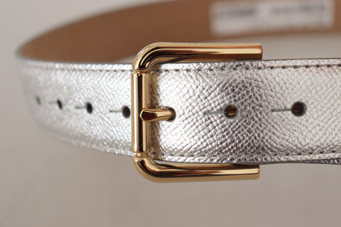 Silver leather belt by Dolce & Gabbana with gold-tone logo metal waist buckle, stylish and modern accessory.