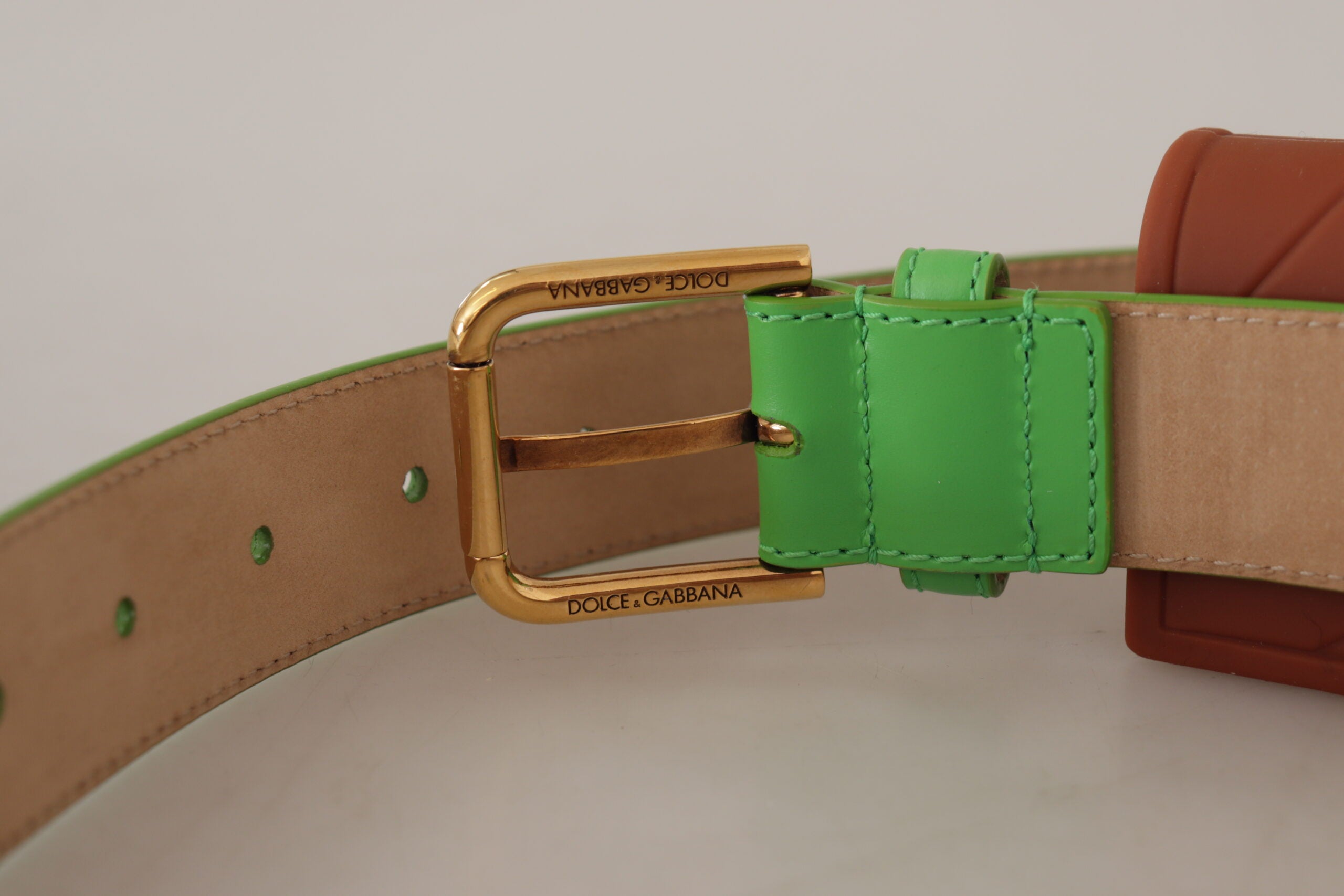 Green leather Devotion Heart micro bag with headphone and belt details, by Dolce & Gabbana.
