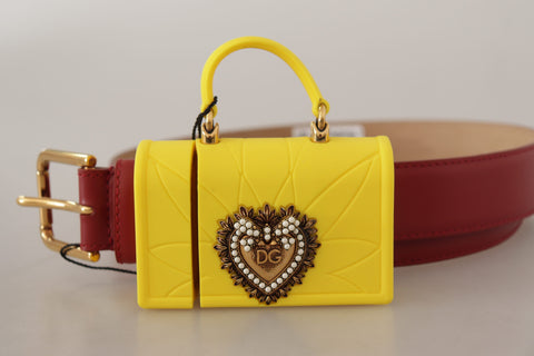 Red leather heart-shaped belt with a yellow DEVOTION buckle by Dolce & Gabbana, featuring a stylish and bold design.