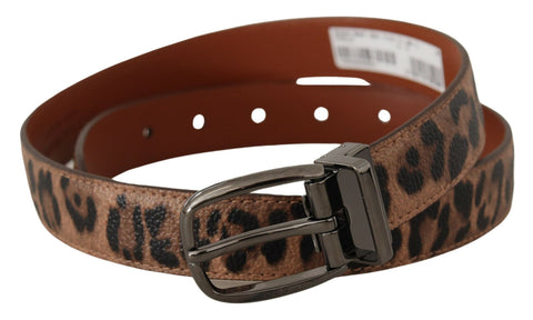 Brown leather belt with leopard embossed pattern and silver buckle from Dolce & Gabbana, featuring stylish animal print design.