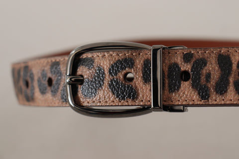 Brown leather belt with leopard embossed pattern and buckle, by Dolce & Gabbana, showcasing detailed texture and stylish design.