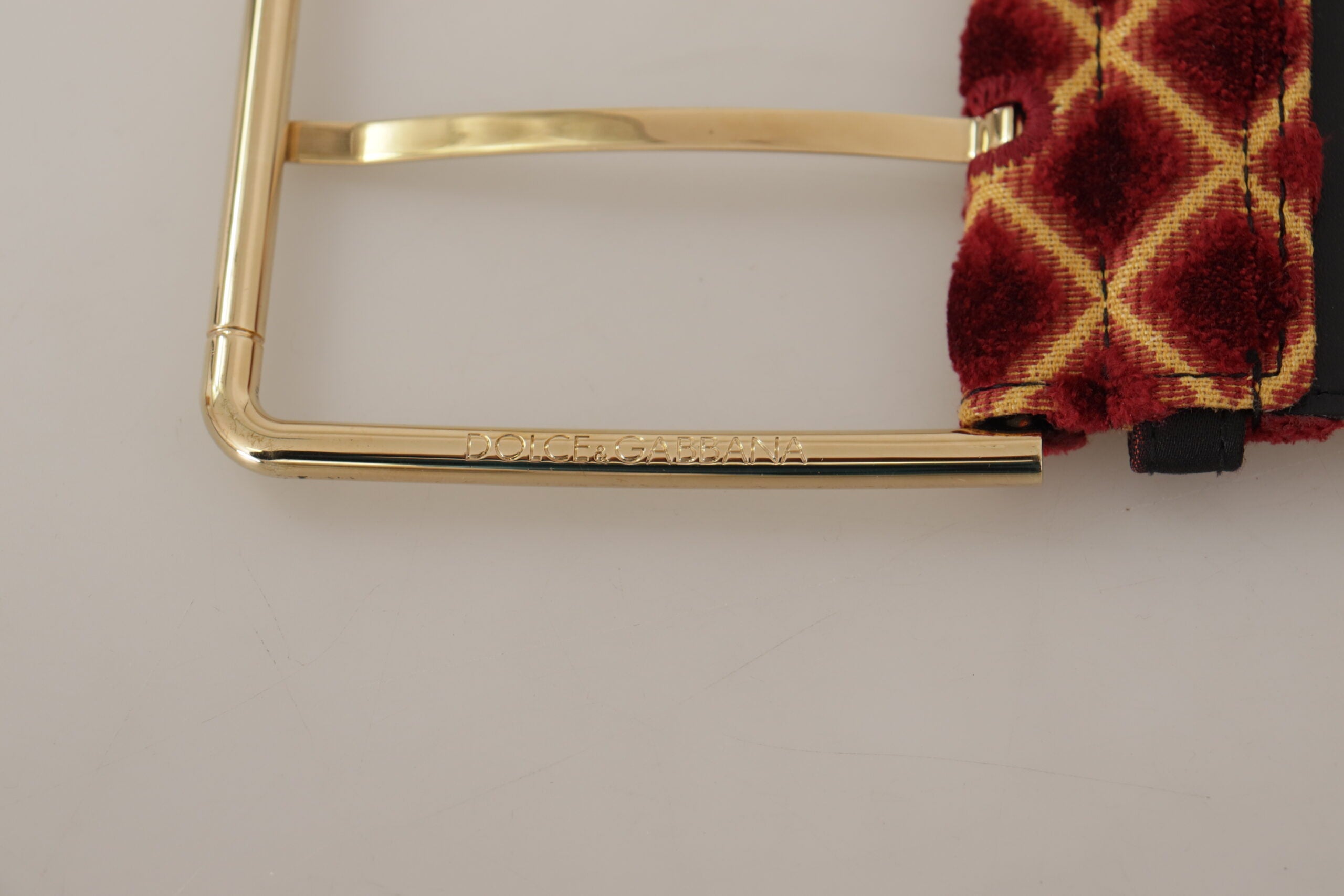Multicolor wide leather belt with floral design and gold metal buckle by Dolce & Gabbana.