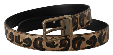 Brown leather belt with leopard print, bronze metal buckle from Dolce & Gabbana, featuring stylish animal print and classic design.