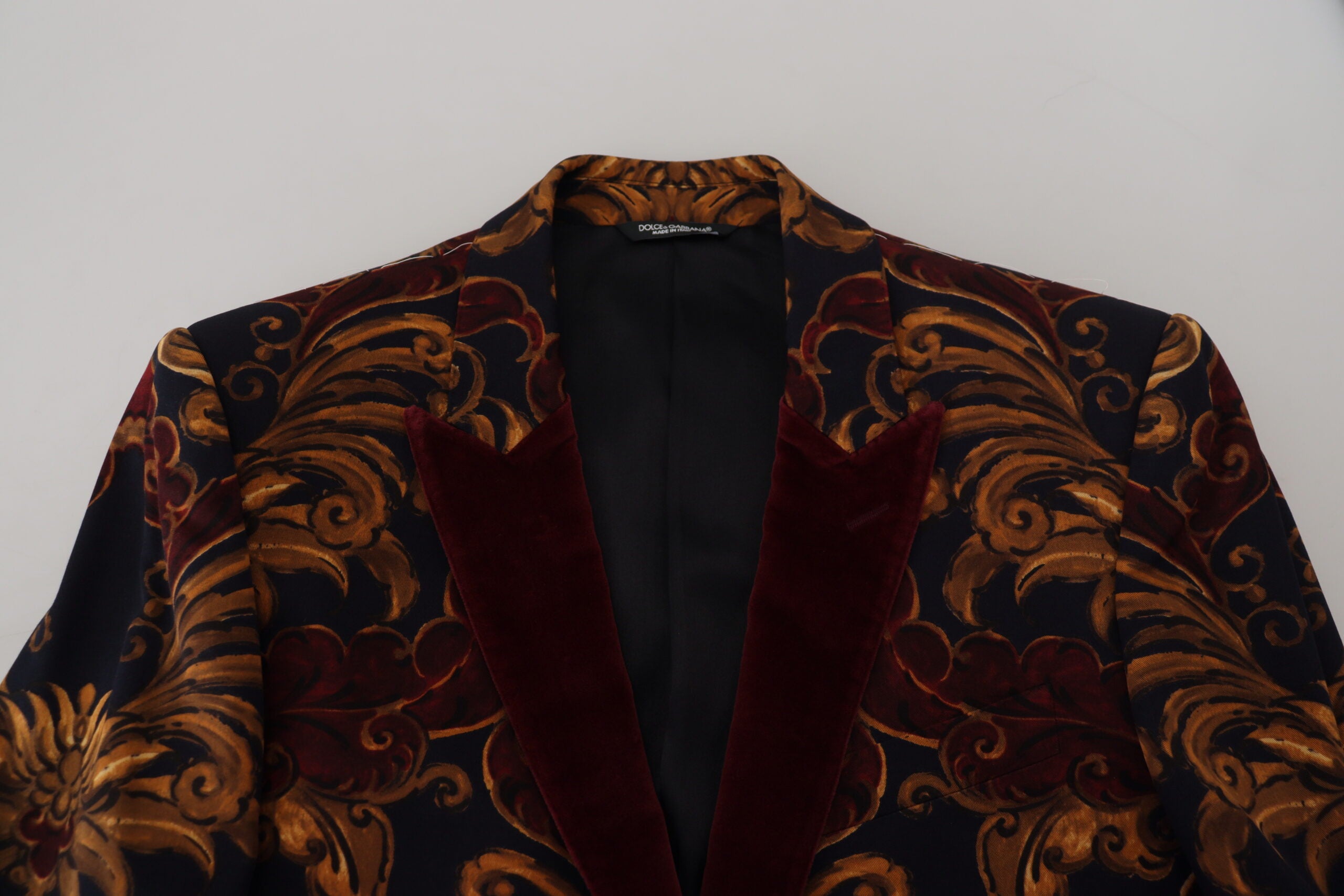 Multicolor floral single-breasted Martini blazer by Dolce & Gabbana, featuring vibrant floral pattern and tailored fit.