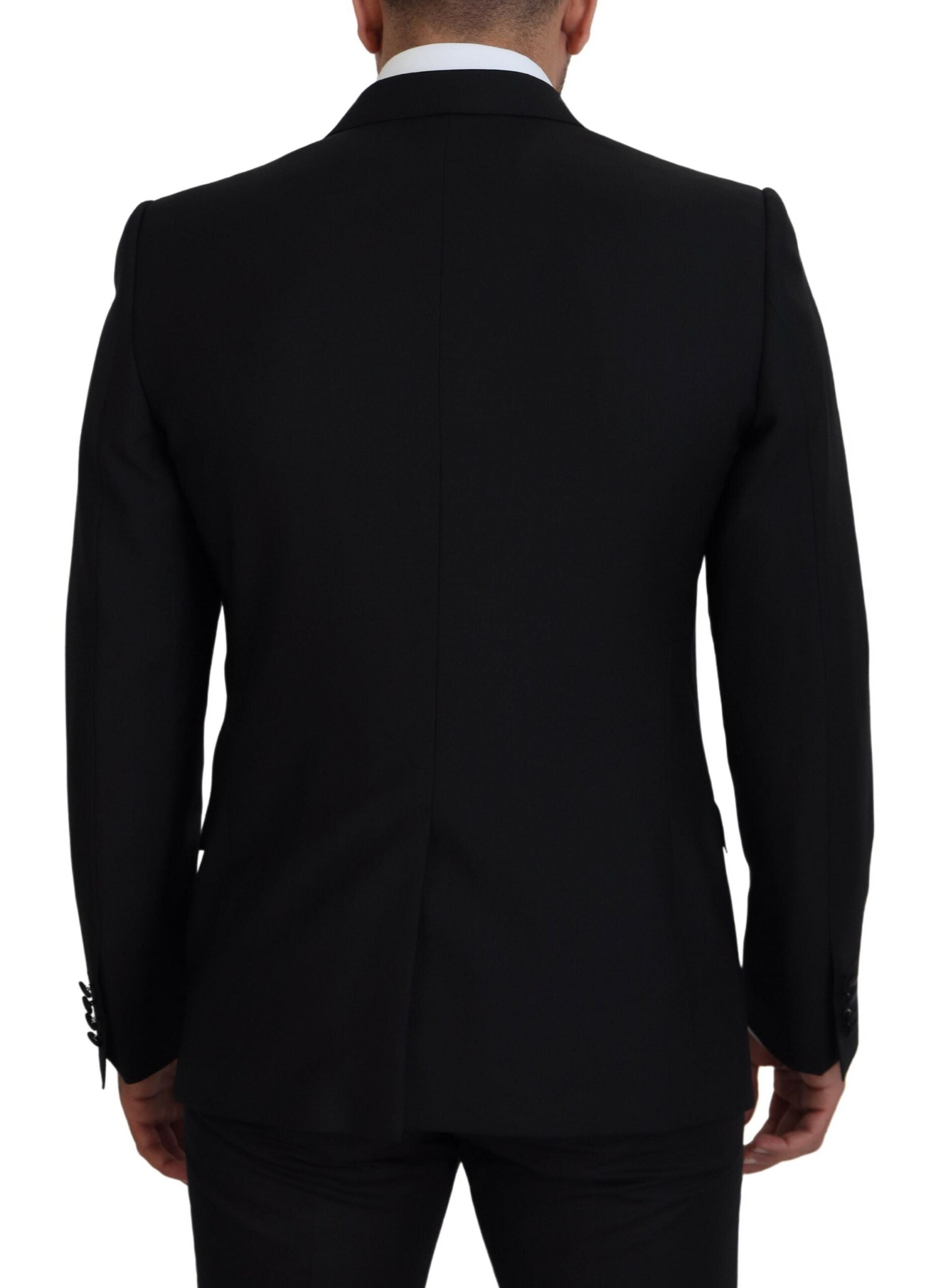 Black slim fit formal blazer by Dolce & Gabbana, tailored design with sleek lapels and structured fit for elegant occasions.