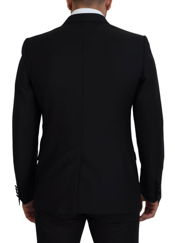 Black slim fit formal blazer by Dolce & Gabbana, tailored design with sleek lapels and structured fit for elegant occasions.