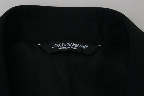 Black slim fit formal blazer by Dolce & Gabbana, tailored fit with classic lapels and sleek design, suitable for elegant occasions.