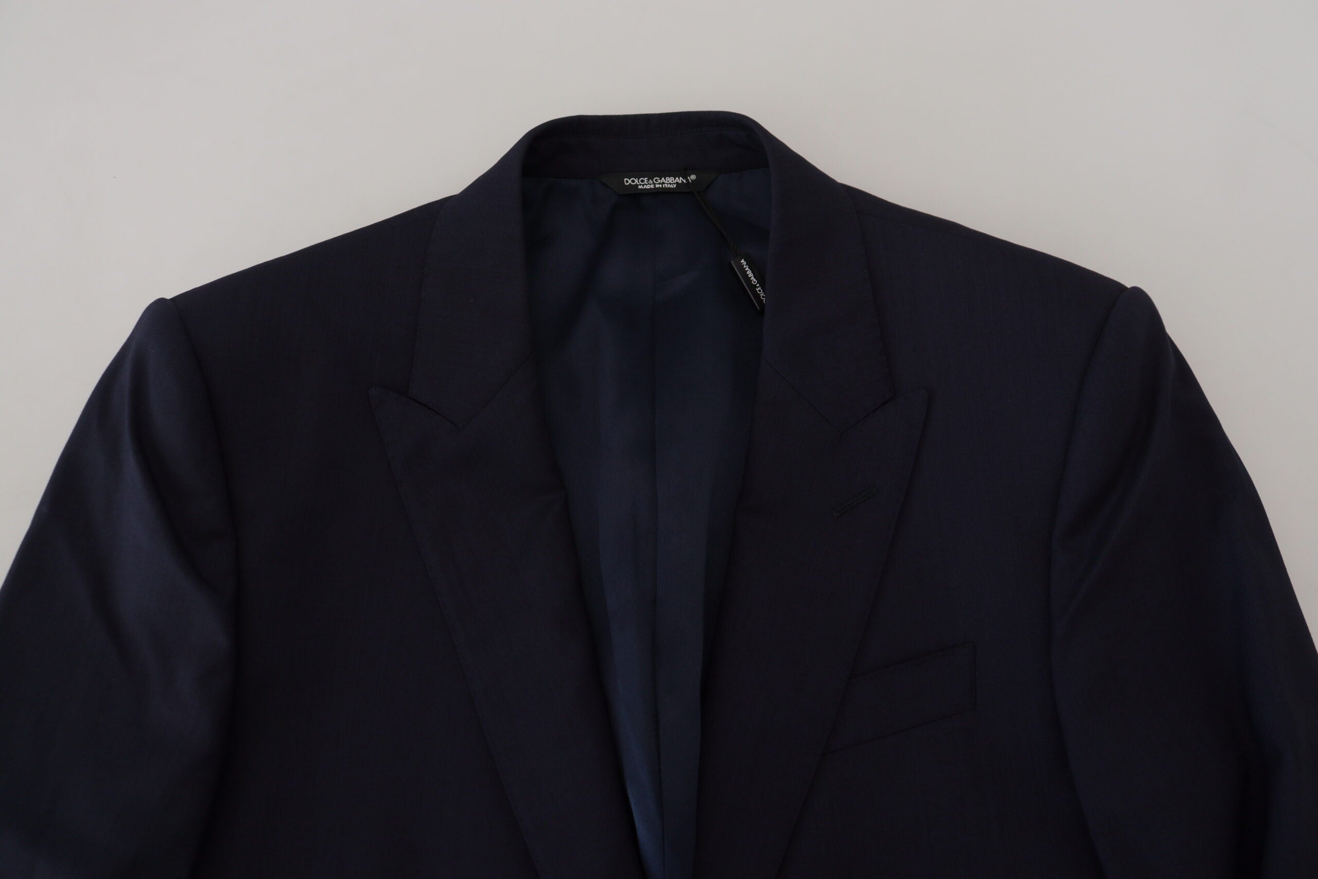 Blue wool slim fit formal blazer by Dolce & Gabbana, tailored with a sleek design and classic lapel for elegant office wear.