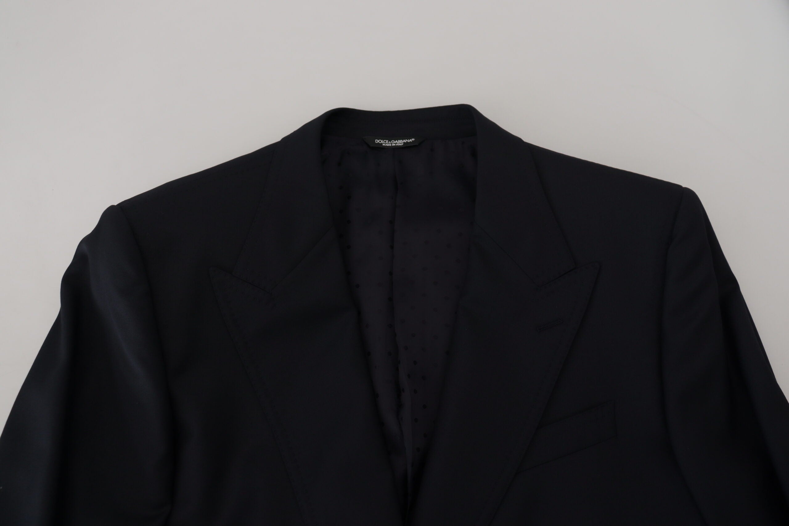 Dark blue wool Sicilia blazer by Dolce & Gabbana, tailored formal blazer with notch lapel and structured fit.