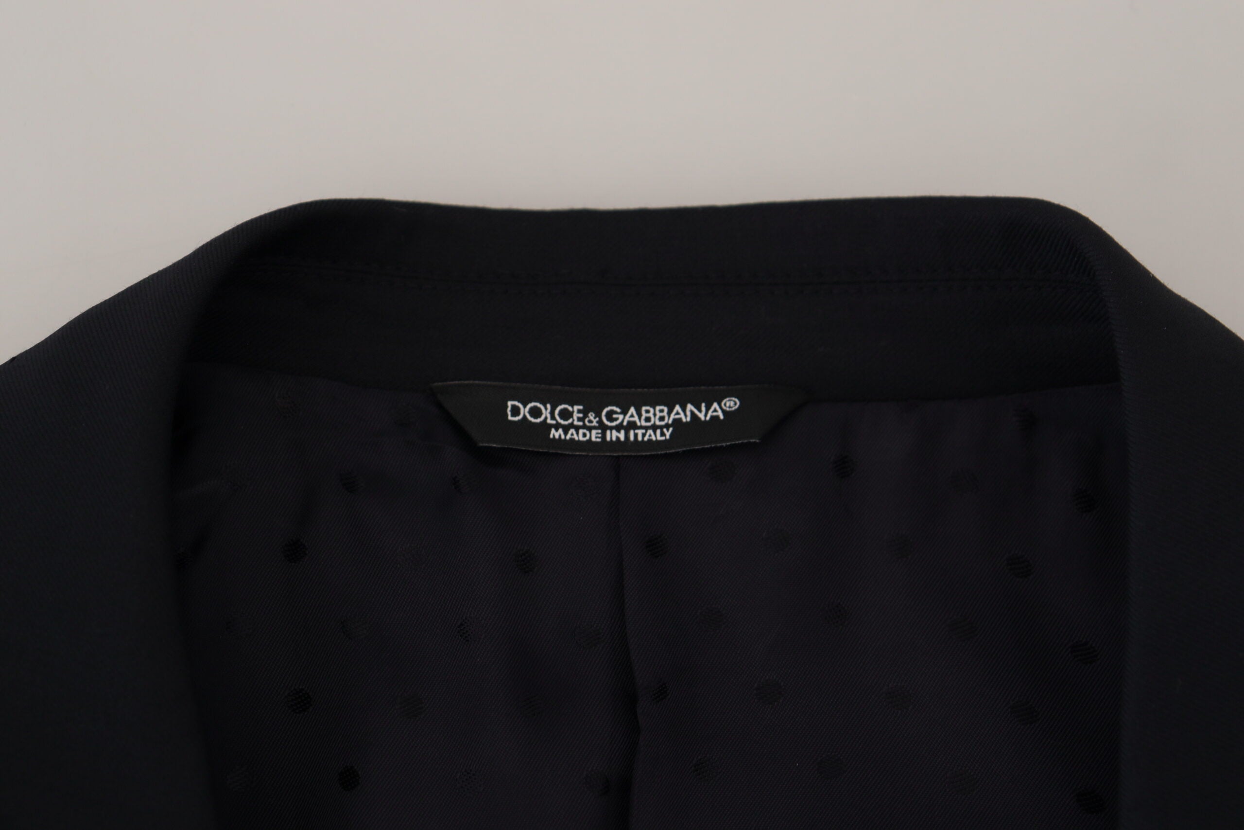 Dark blue wool Sicilia blazer by Dolce & Gabbana, tailored fit, featuring notch lapels and button closure, formal men's jacket.