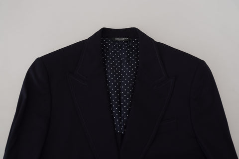 Blue wool formal Taormina blazer by Dolce & Gabbana, tailored fit with classic lapel, displayed on a hanger.