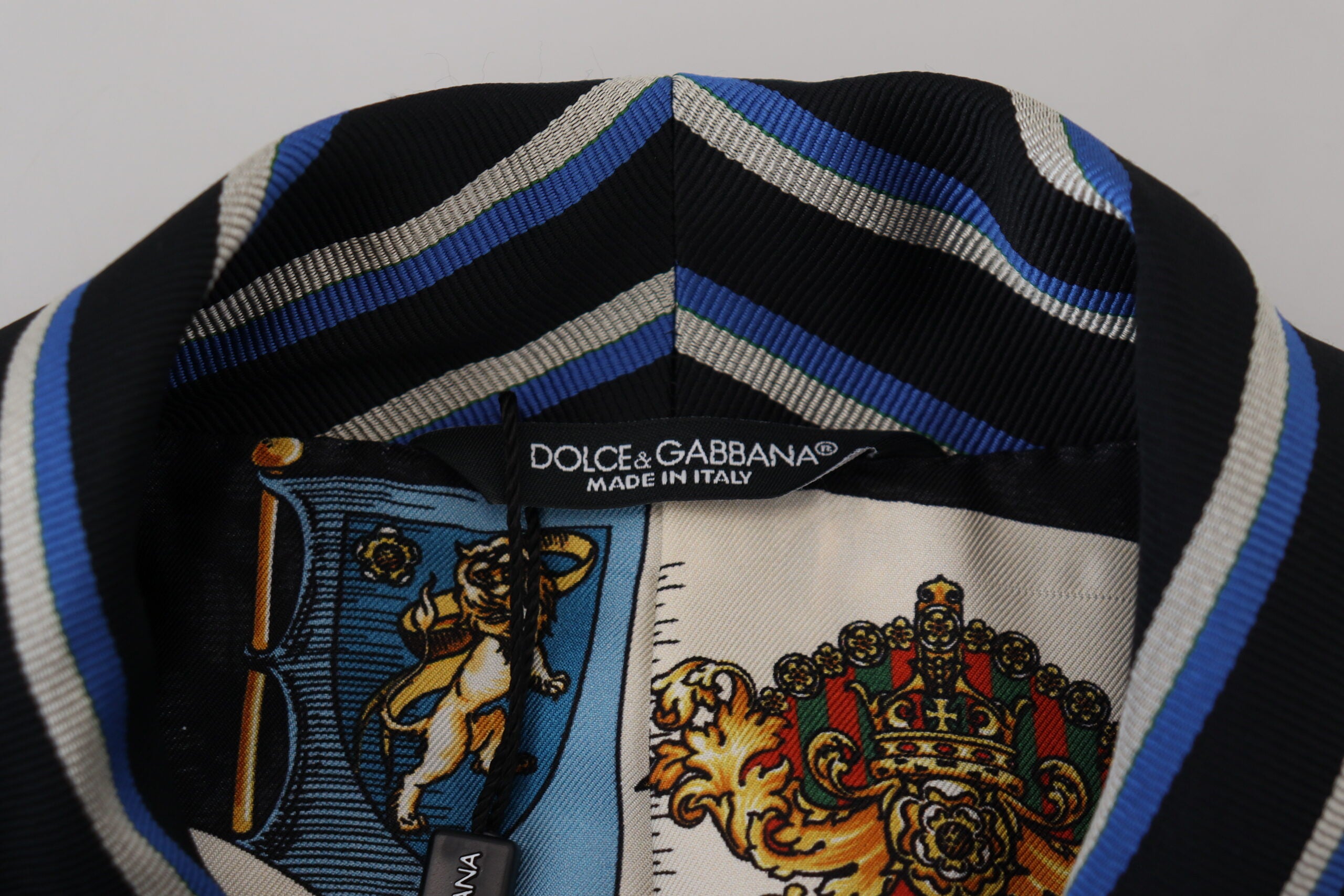 Dolce & Gabbana black and blue printed lining robe with luxurious fabric and elegant design, displayed on a hanger.