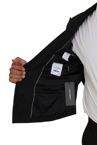 Black polyester men's two-piece Martini suit by Dolce & Gabbana, featuring a tailored blazer and matching trousers.